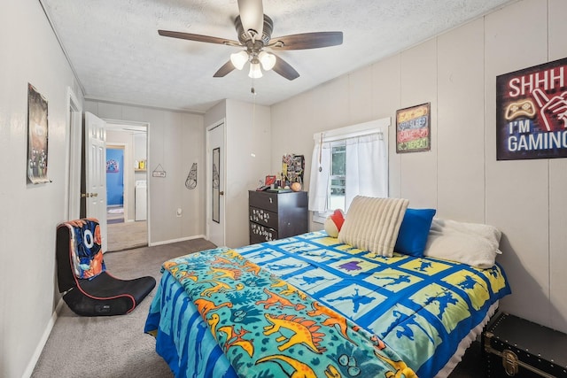 bedroom with baseboards, ceiling fan, carpet flooring, and a textured ceiling