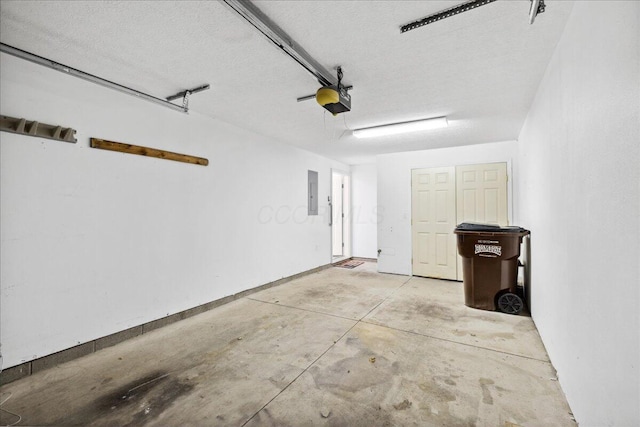 garage featuring a garage door opener and electric panel