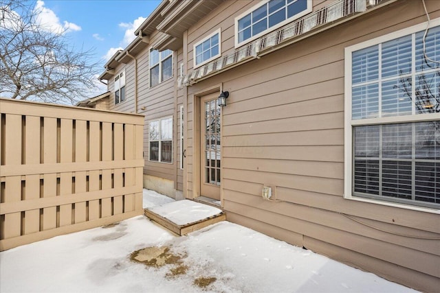 view of snow covered property