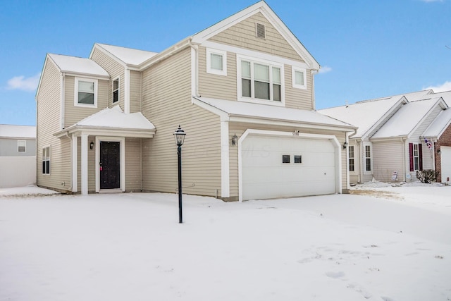 traditional-style house featuring an attached garage