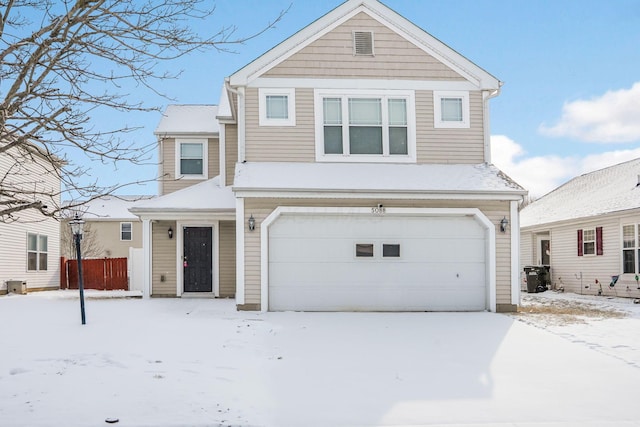 traditional home featuring a garage