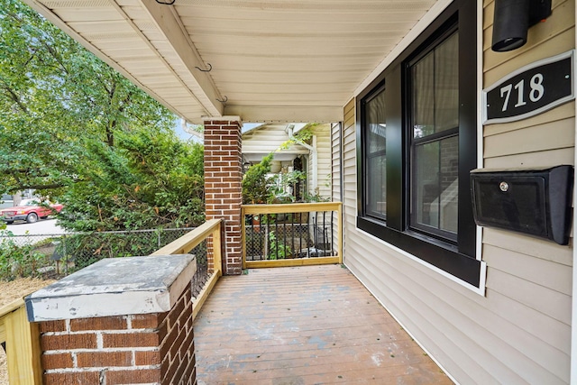 wooden deck featuring a porch