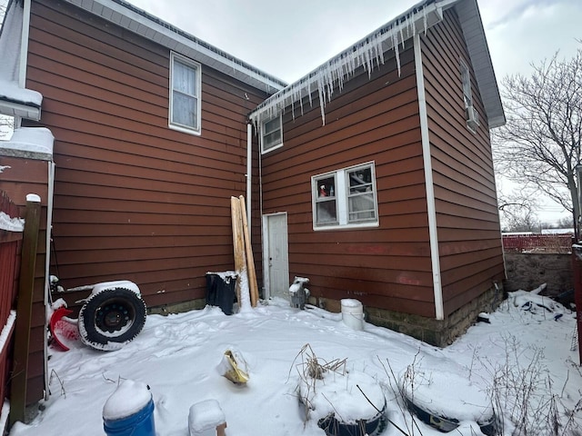 view of snow covered property