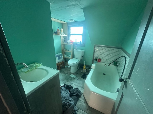 235 Oak St, Marion, OH 43302 - bathroom with toilet, vanity, and a bath