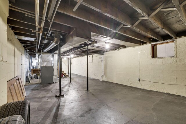 unfinished basement with heating unit