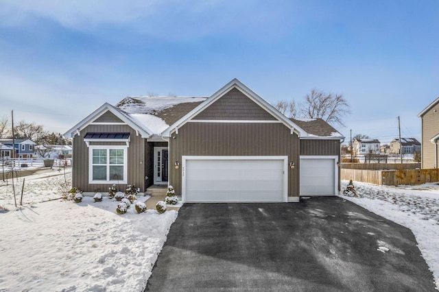 view of front of home with a garage