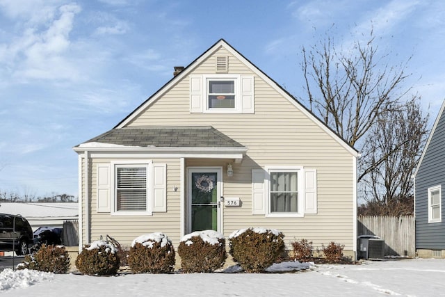 bungalow-style house featuring central air condition unit