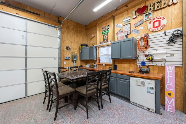 garage with wood walls