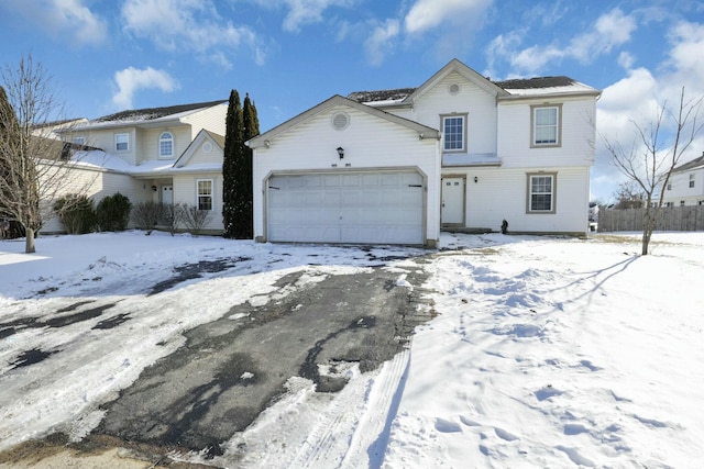 view of front of property featuring a garage