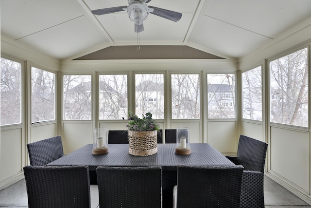 sunroom featuring vaulted ceiling and a ceiling fan