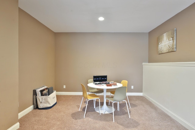 carpeted dining area with baseboards and recessed lighting