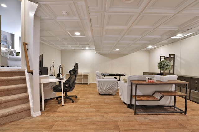 office area with light wood-type flooring and baseboards