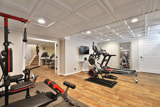 workout area with recessed lighting, baseboards, and wood finished floors