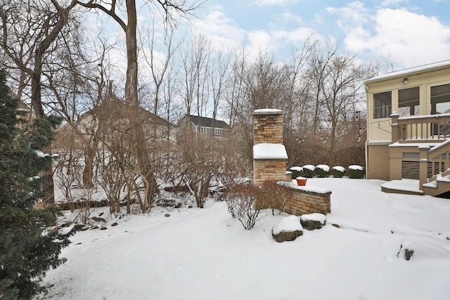 yard covered in snow with stairway