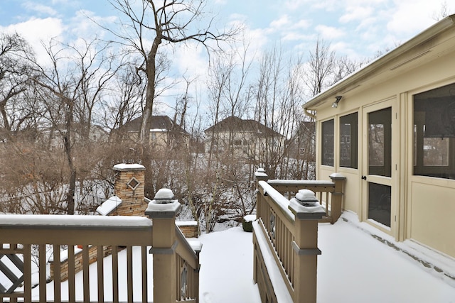 view of snow covered deck