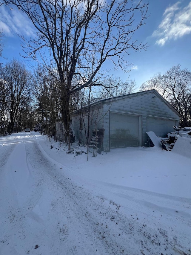 view of snow covered garage