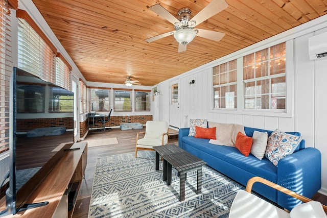 sunroom with ceiling fan, an AC wall unit, and wooden ceiling