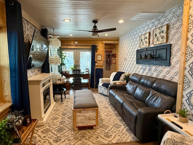 living area featuring ceiling fan, wooden ceiling, and recessed lighting