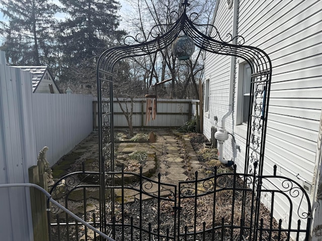 exterior space featuring a fenced backyard