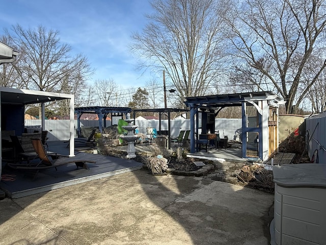 view of patio / terrace featuring a fenced backyard and a pergola