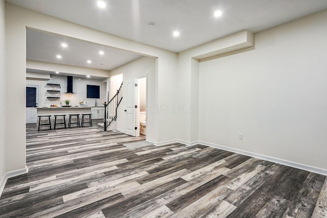 interior space with dark hardwood / wood-style flooring