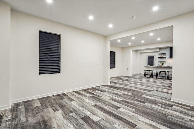 interior space with hardwood / wood-style floors