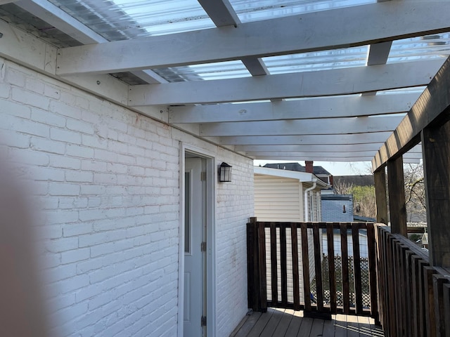 wooden terrace with a pergola