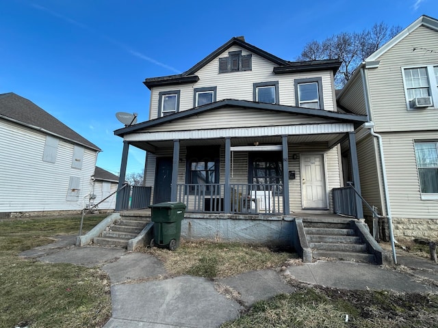 view of front of house with a porch and cooling unit