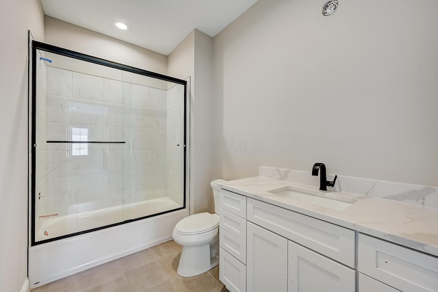 full bath featuring recessed lighting, toilet, combined bath / shower with glass door, vanity, and tile patterned floors