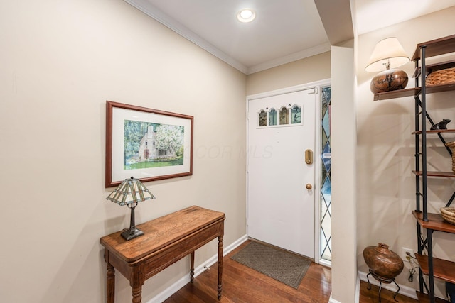 entrance foyer featuring baseboards, dark wood-type flooring, recessed lighting, and crown molding