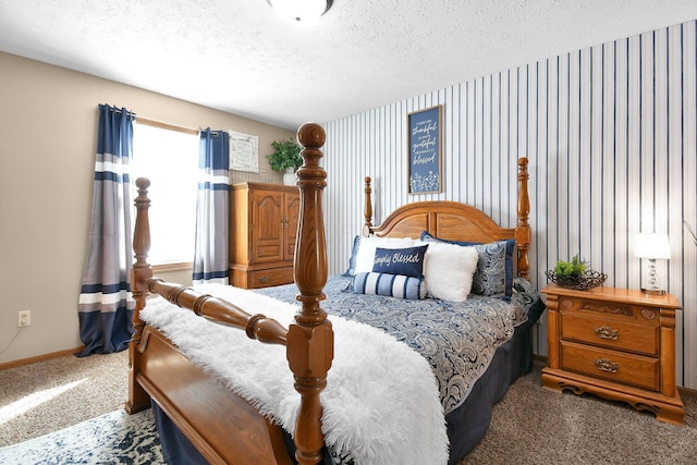 bedroom featuring carpet, a textured ceiling, baseboards, and wallpapered walls