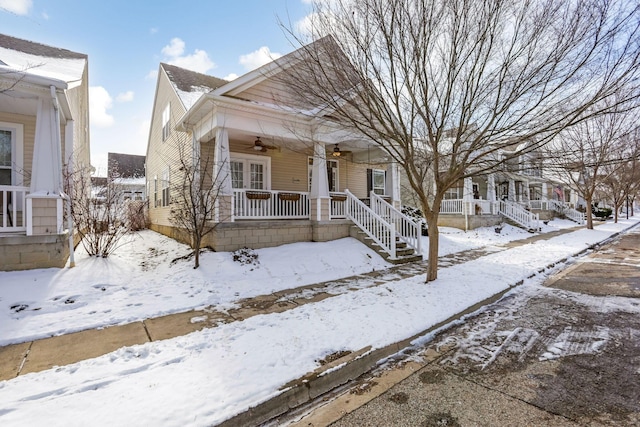 view of front of house featuring ceiling fan