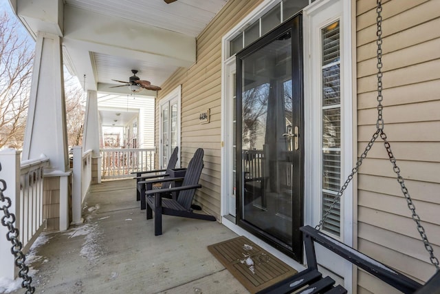 view of patio featuring covered porch and ceiling fan