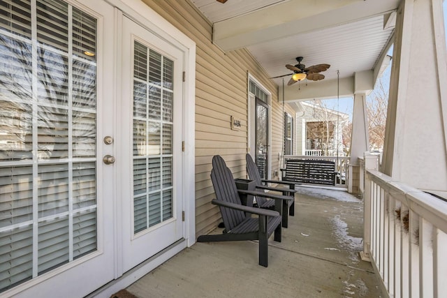 view of patio with a porch and a ceiling fan