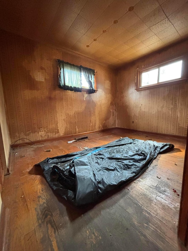 interior space featuring visible vents and hardwood / wood-style flooring