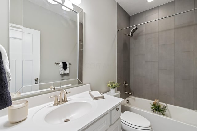 full bathroom featuring shower / washtub combination, vanity, and toilet