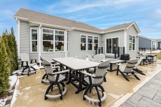 view of patio / terrace featuring a fire pit and outdoor dining space