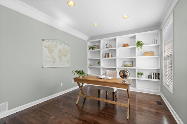 office with hardwood / wood-style floors, visible vents, a healthy amount of sunlight, and crown molding