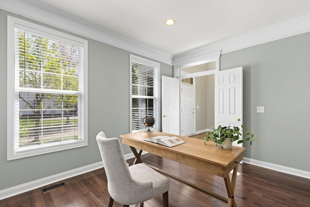 home office featuring baseboards, visible vents, crown molding, and plenty of natural light