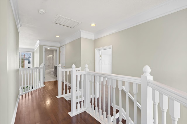 hallway with crown molding, an upstairs landing, visible vents, recessed lighting, and wood finished floors