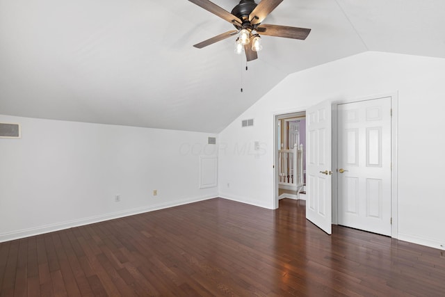 bonus room featuring vaulted ceiling, ceiling fan, dark wood-style flooring, baseboards, and visible vents