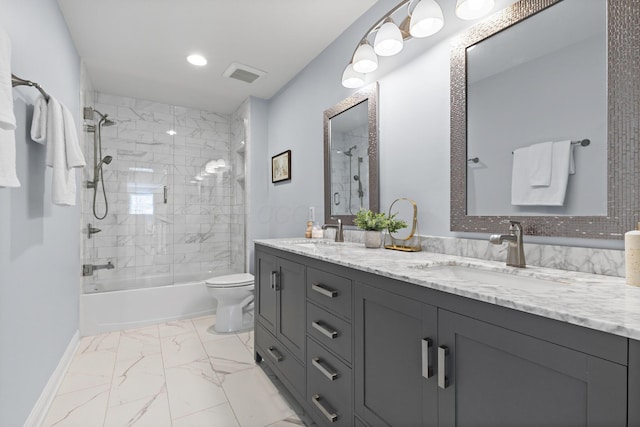 bathroom featuring double vanity, visible vents, marble finish floor, and a sink