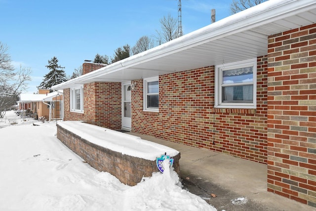 view of snow covered patio