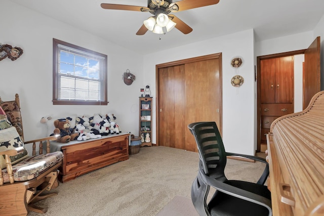 office with ceiling fan and carpet