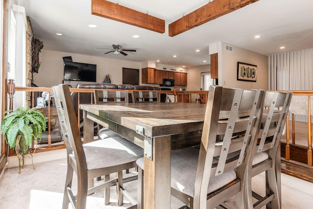 dining area with a ceiling fan, visible vents, beamed ceiling, and recessed lighting