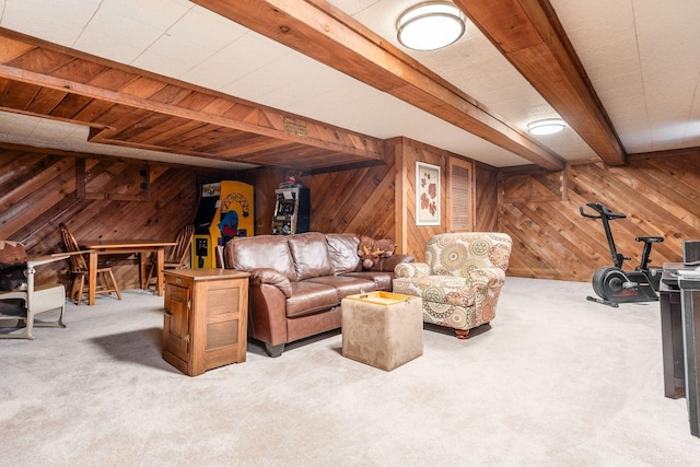 carpeted living area with wooden walls and beam ceiling