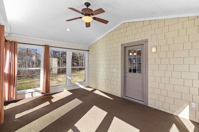 unfurnished sunroom with lofted ceiling and ceiling fan