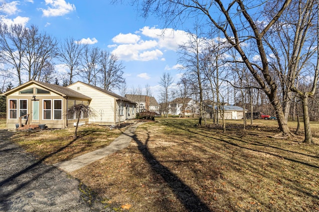 view of side of property with entry steps