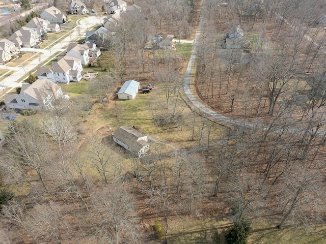 birds eye view of property with a residential view