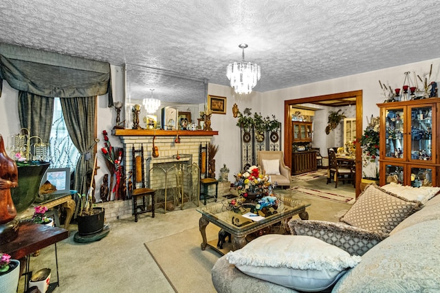 carpeted living area with a brick fireplace, a textured ceiling, and an inviting chandelier